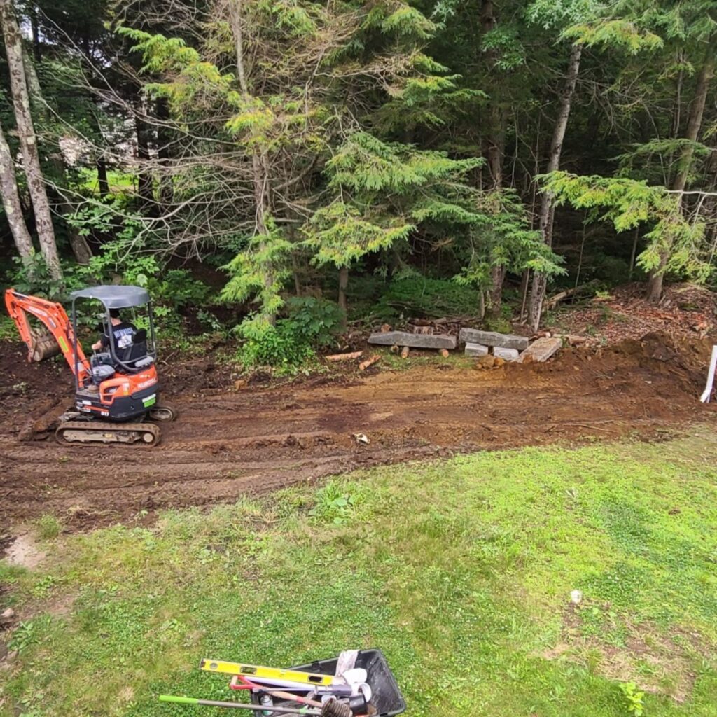 Stump and boulder removal on a Central Massachusetts property